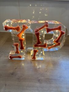 Resin letters with dog bones and lights